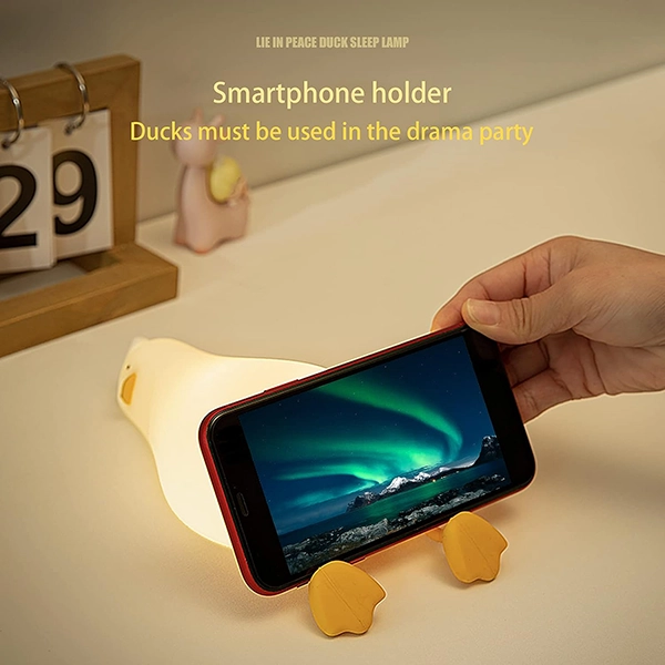 DUCKY®: Nu doar o lampă, ci și un suport convenabil pentru smartphone-ul tău